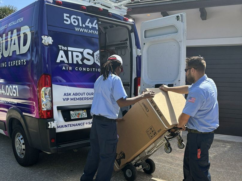 AirSquad-AC-Install-808×606 The Air Squad team moving HVAC units out of work van